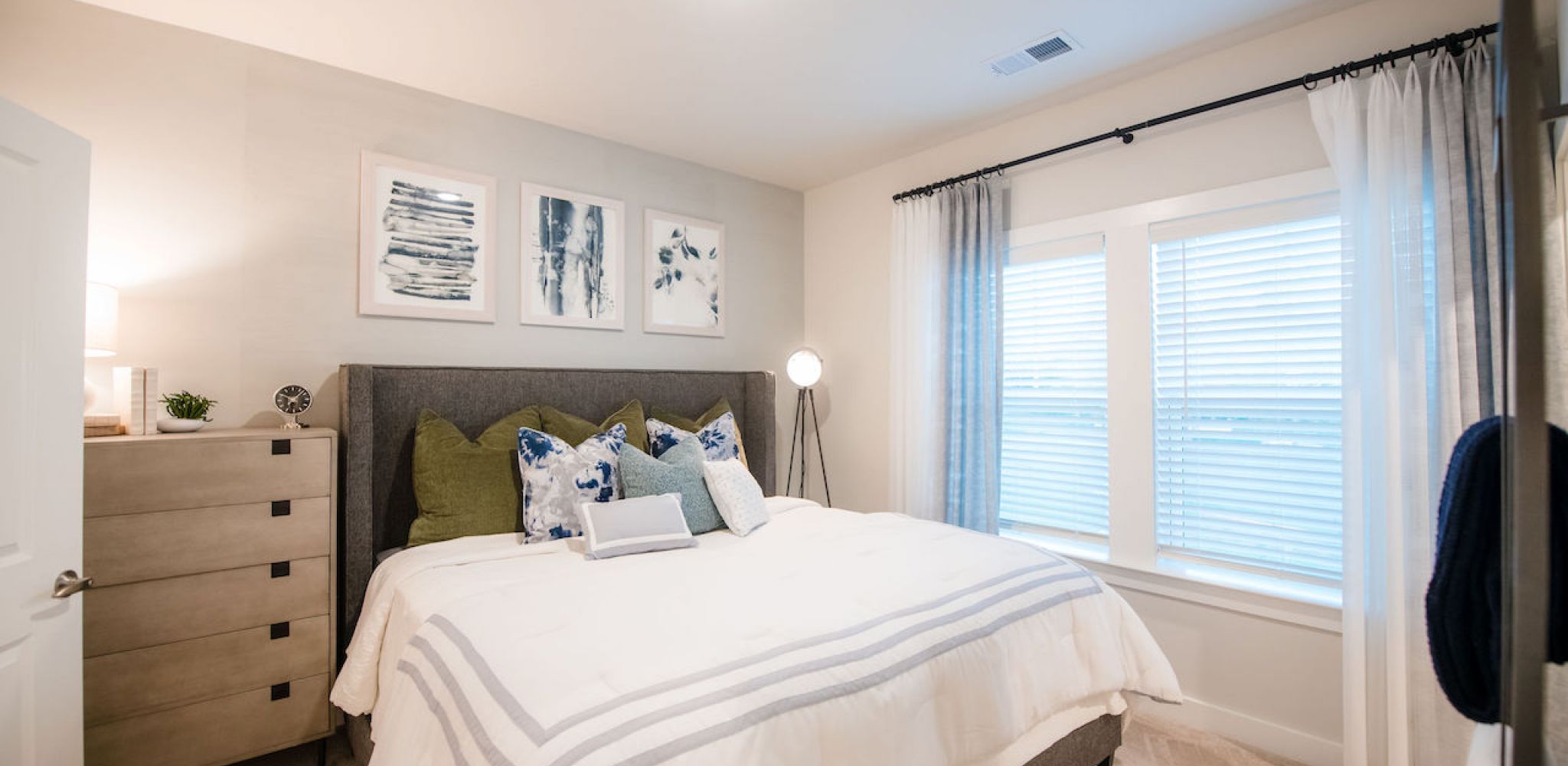 Hawthorne at the Pointe spacious apartment bedroom with carpet and large windows